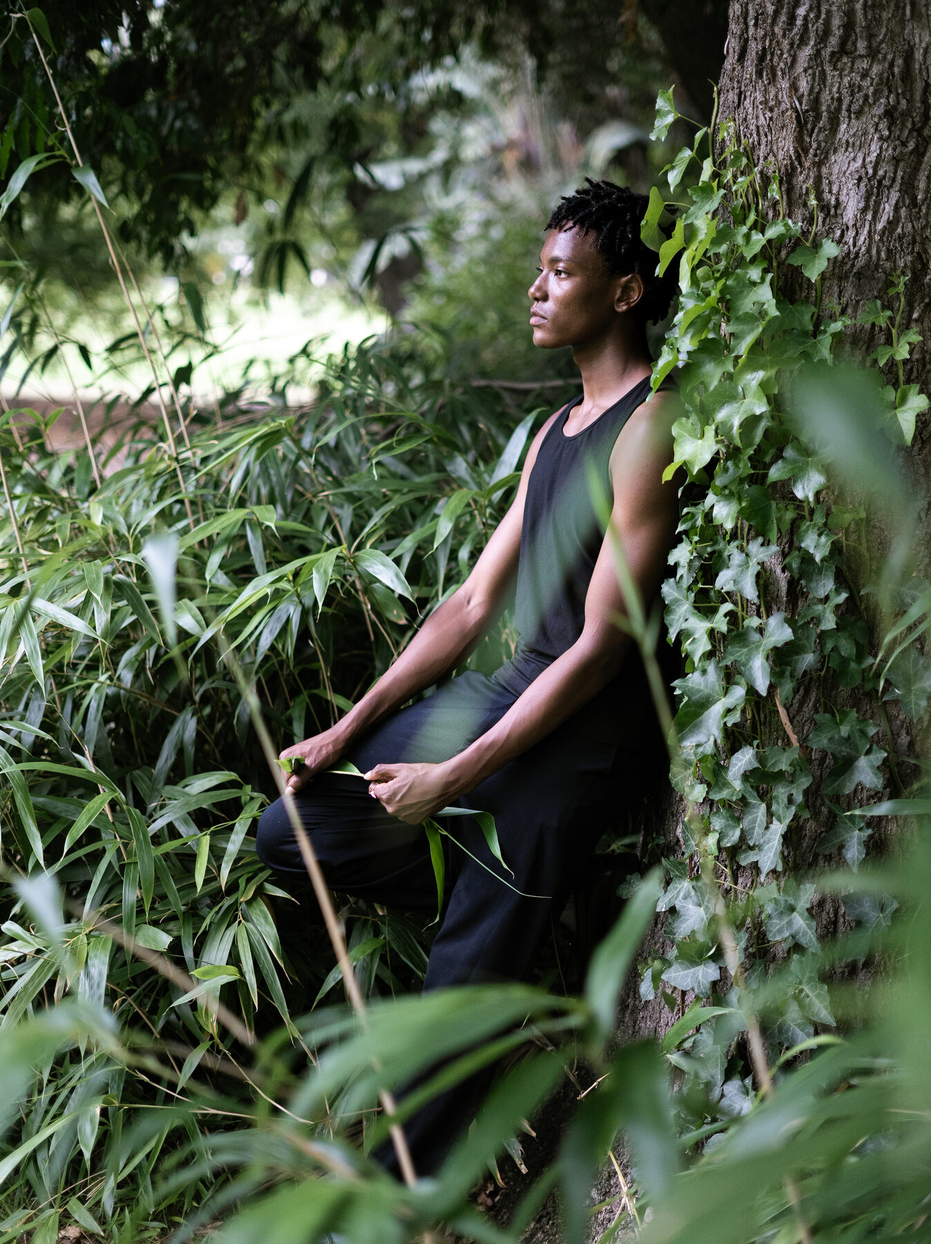 Editorial portrait among ivy